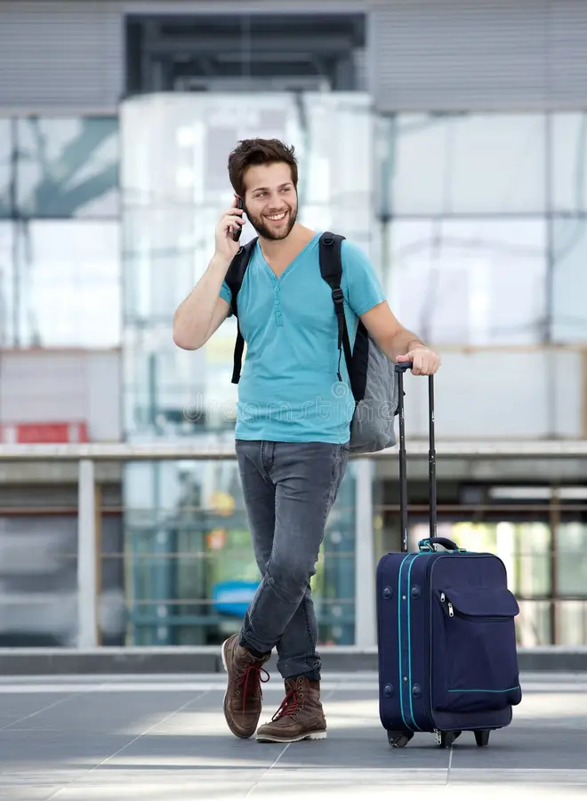 male-traveler-talking-mobile-phone-portrait-young-43828678 | LEMMETravel.com®